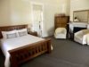 Luxury Hotel Rooms, with large bed, sitting area, with fireplace and wardrobe 